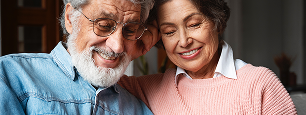 Older couple smiling together