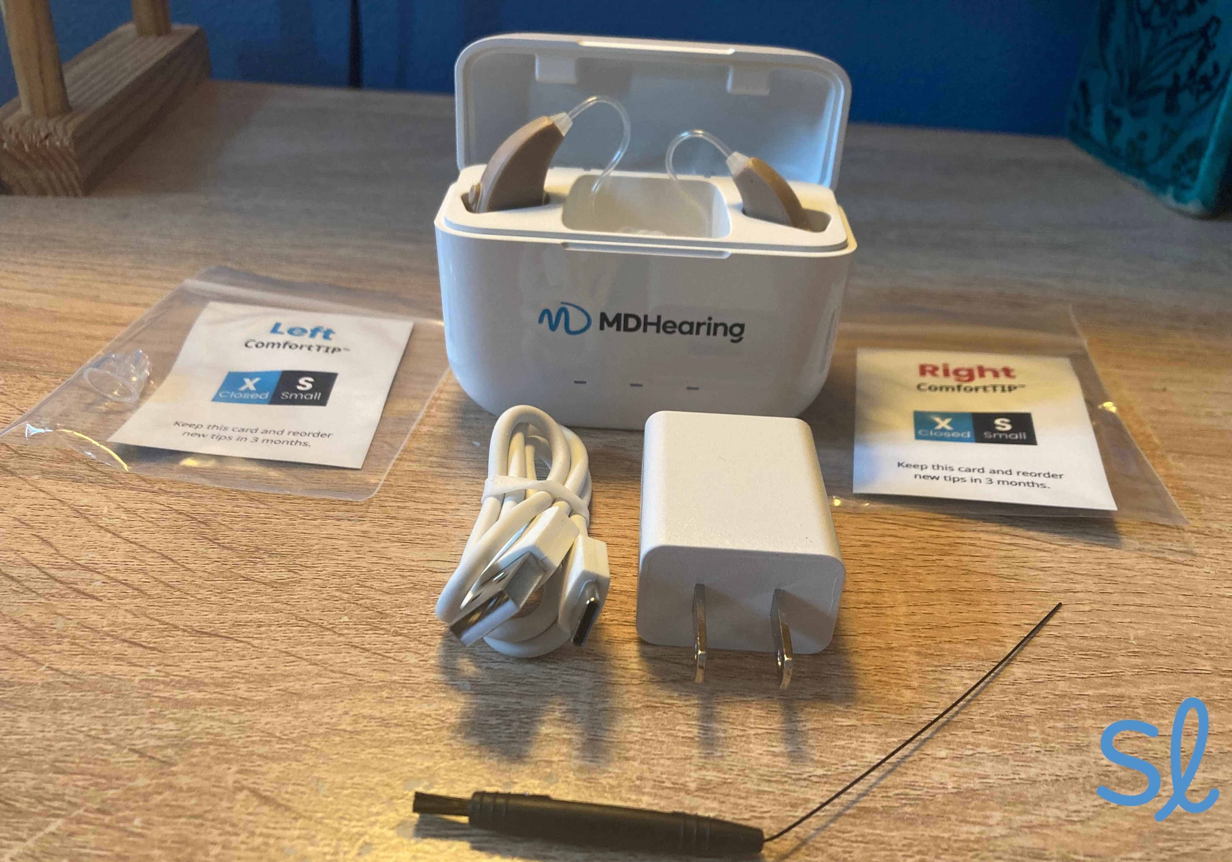 My MDHearing VOLT MAX devices in their charger