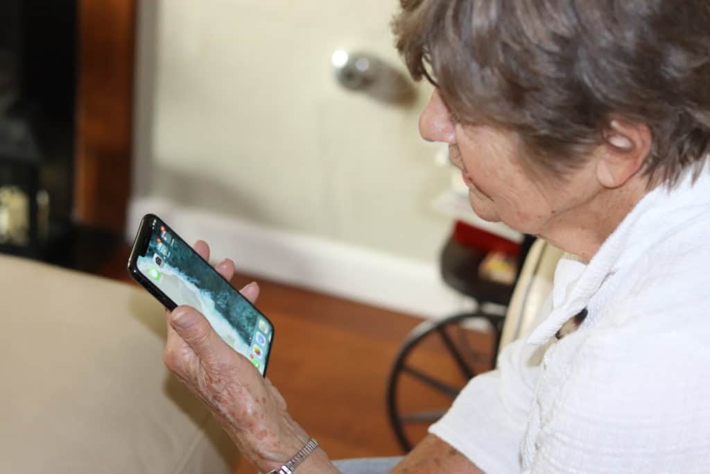 Our Editor's grandma testing out the iPhone 11 Pro