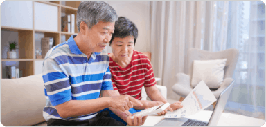 Older couple looking at documents
