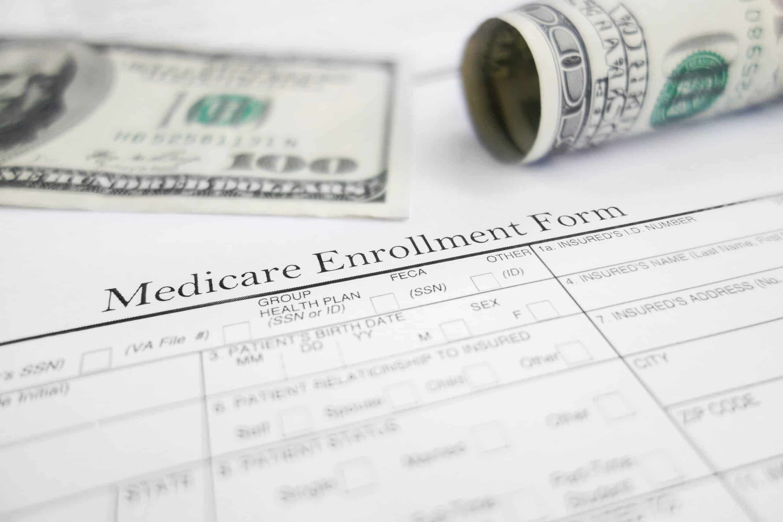 Medicare enrollment form and money
