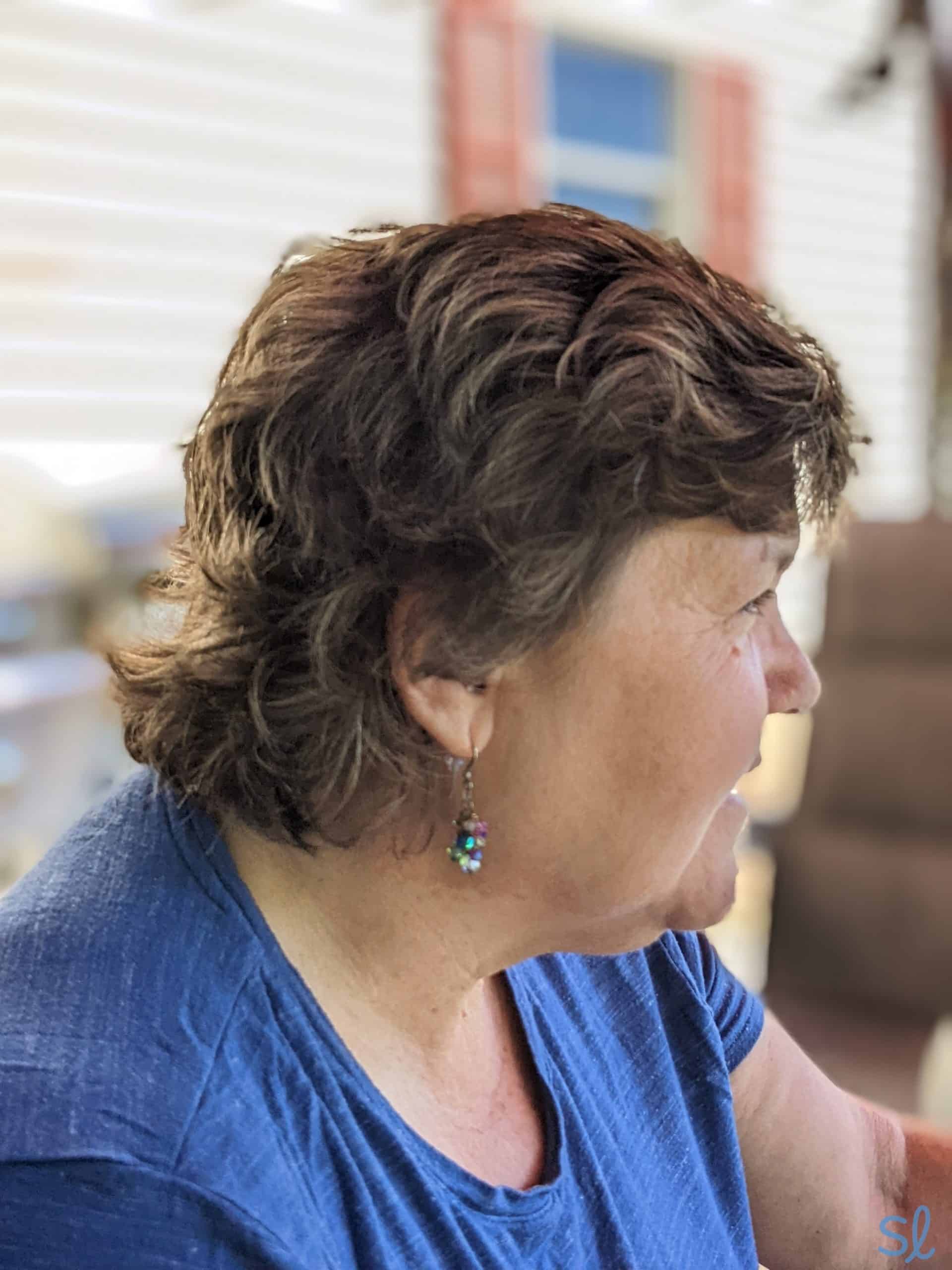 Side view of person wearing Atom Pro Hearing Aids
