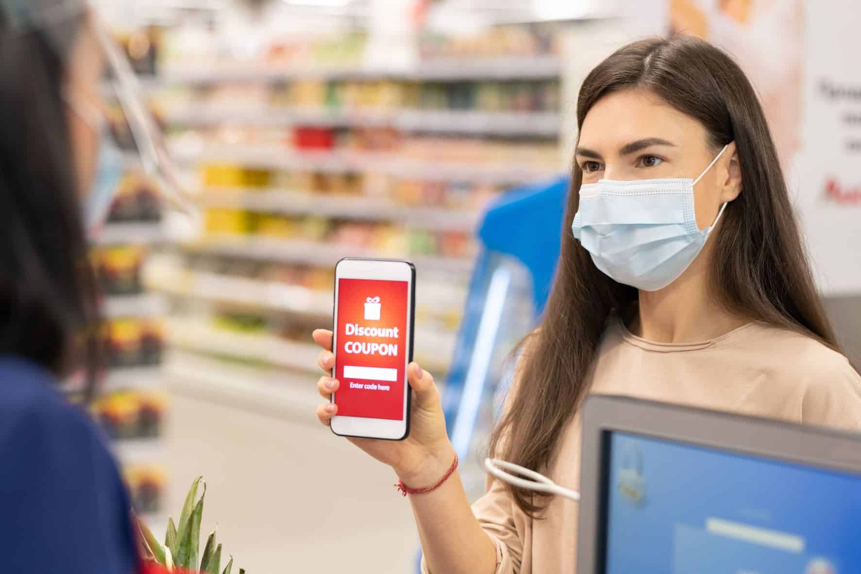 Woman using a prescription discount to buy medications