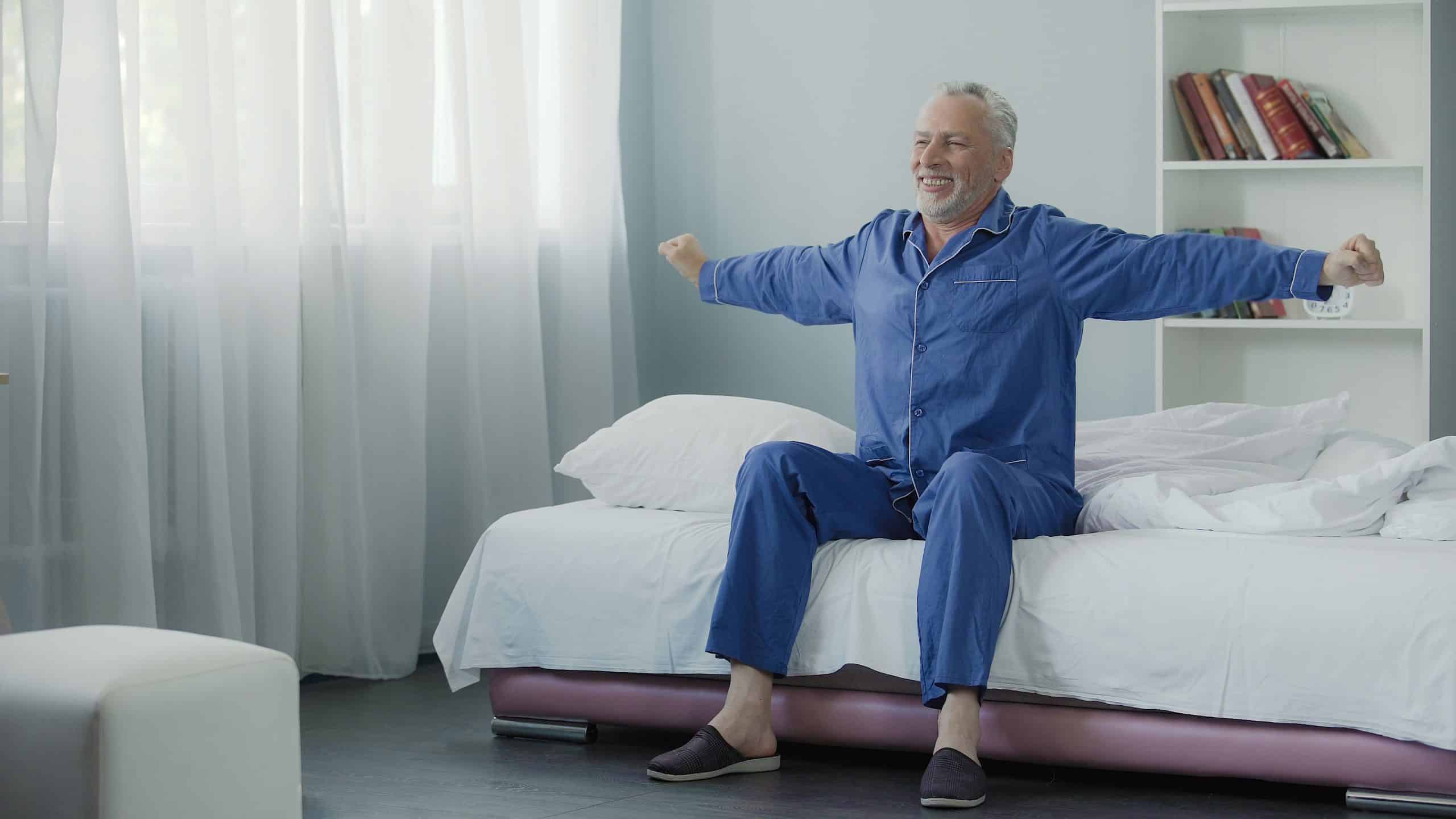 Man getting out of bed