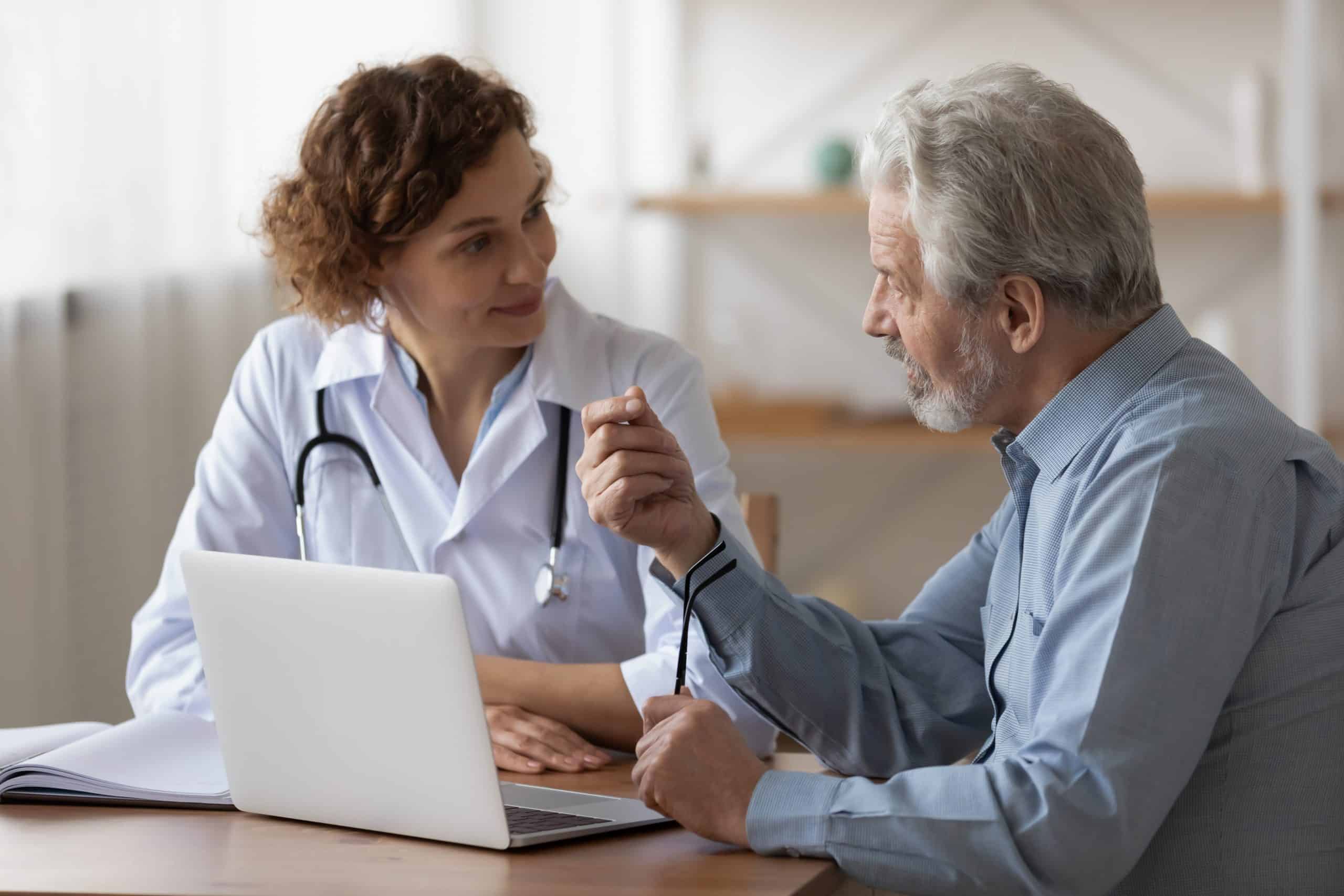 Senior talking with doctor about medications