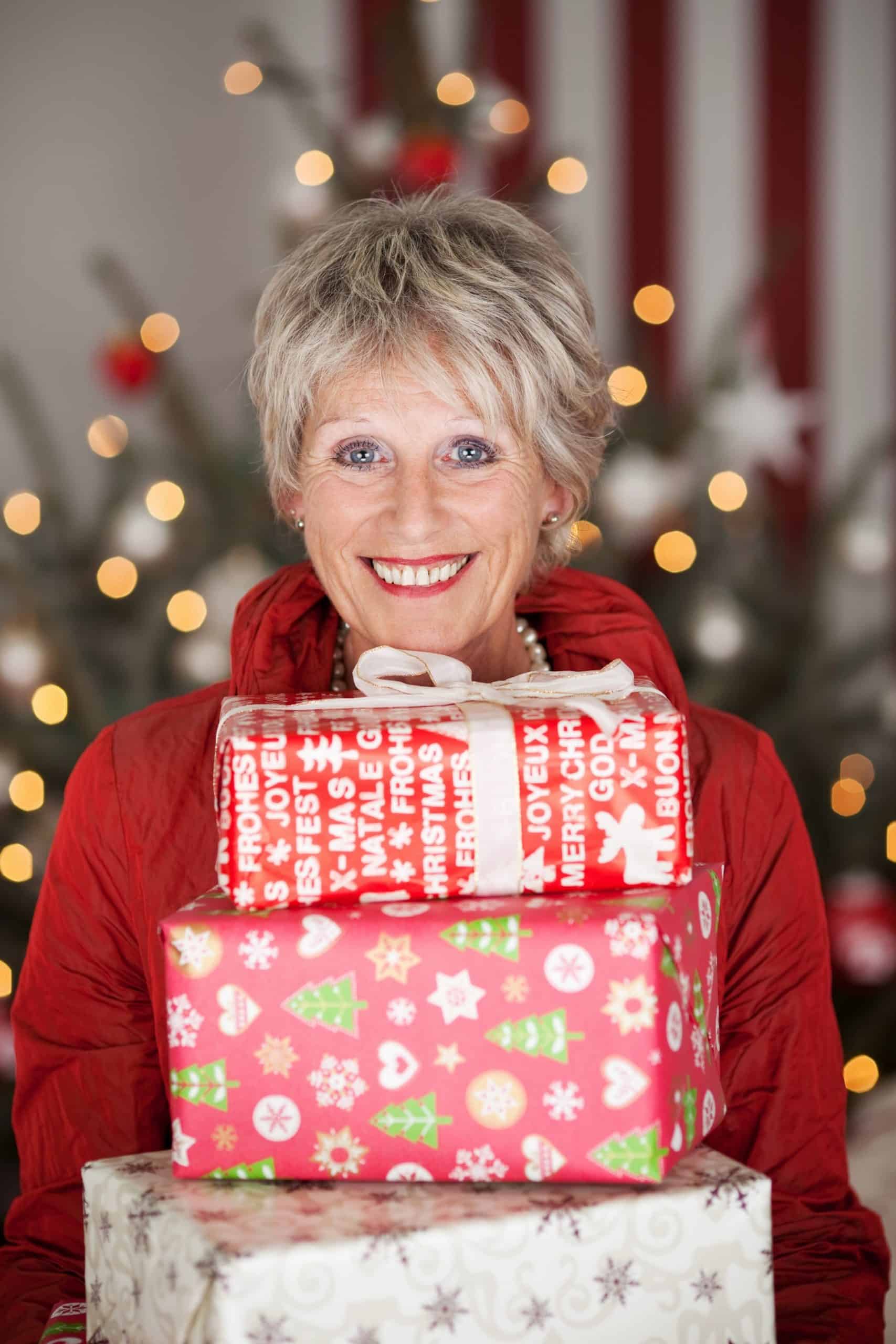 A woman holding gifts