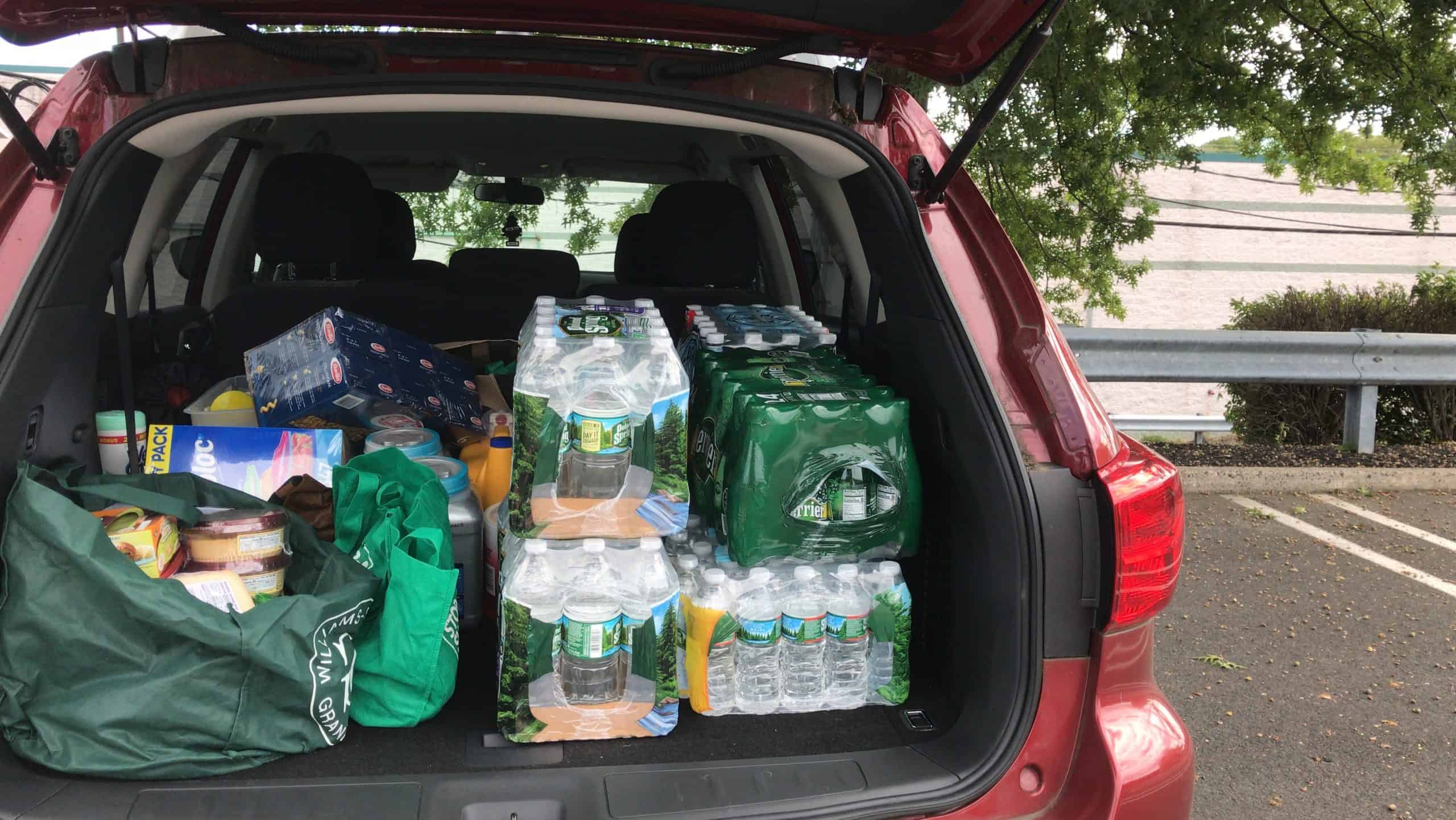 Drinks in bulk packaging in trunk of car