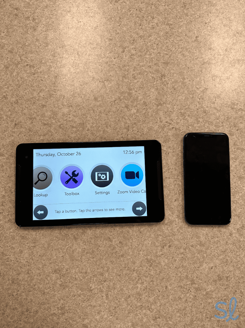 Comparing the large size of Consumer Cellular's GrandPad to my iPhone