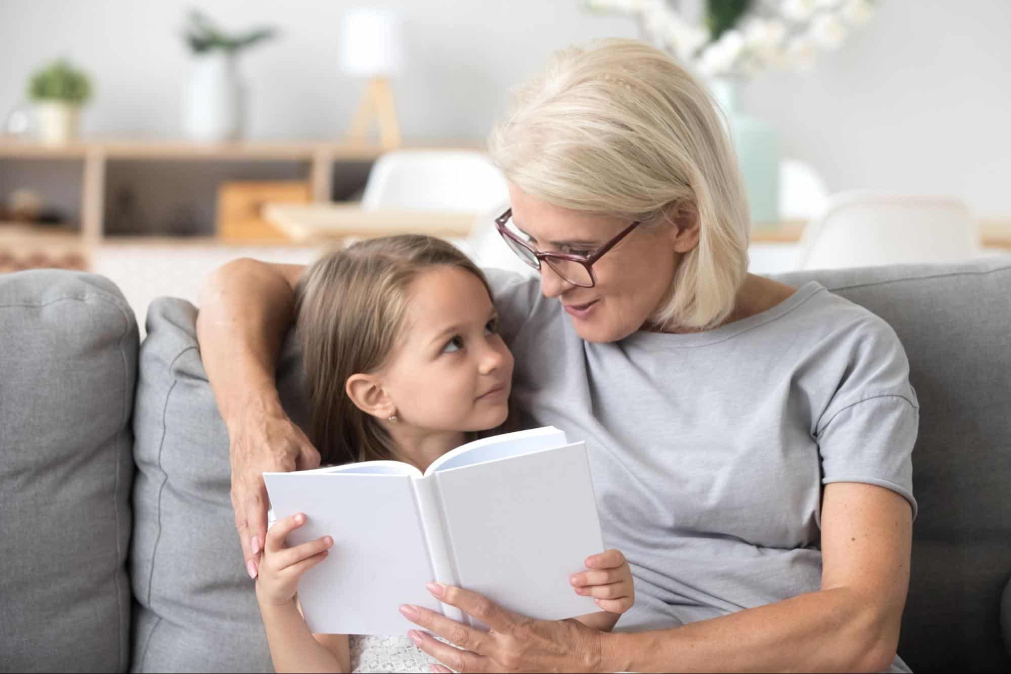 An adult reading a story to a child