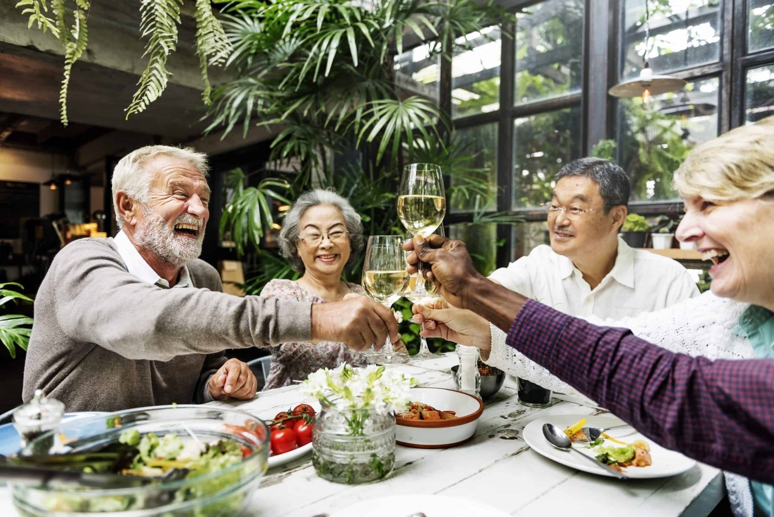 A group of seniors having dinner together