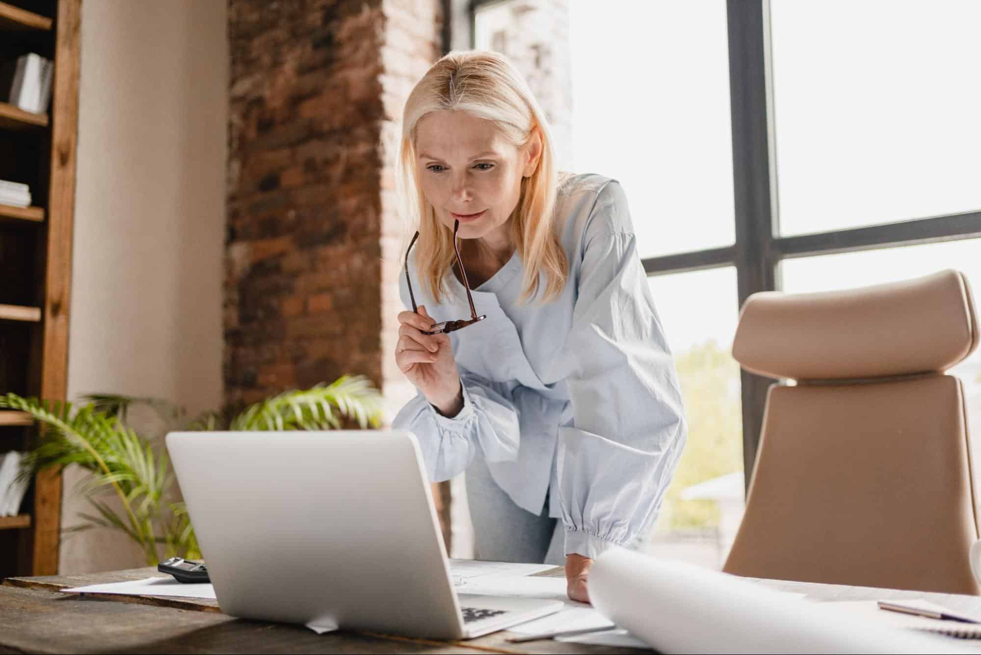 Woman looking a computer