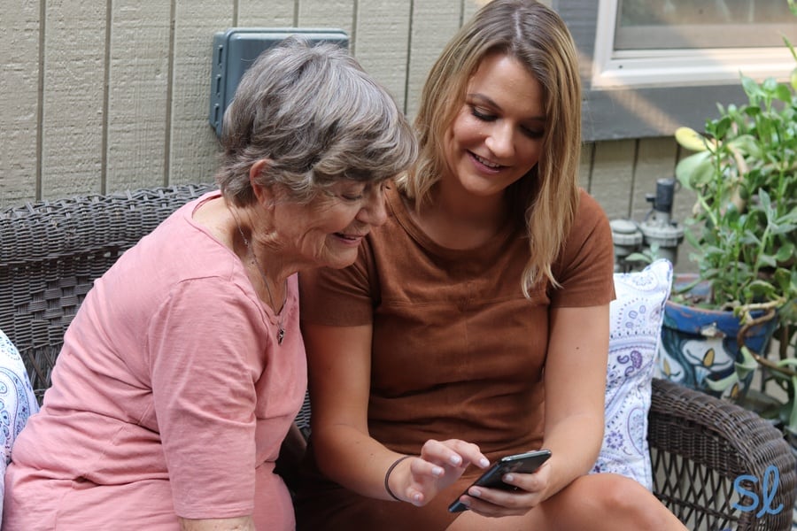 Our editor showing her grandma how to use the iPhone 11 Pro