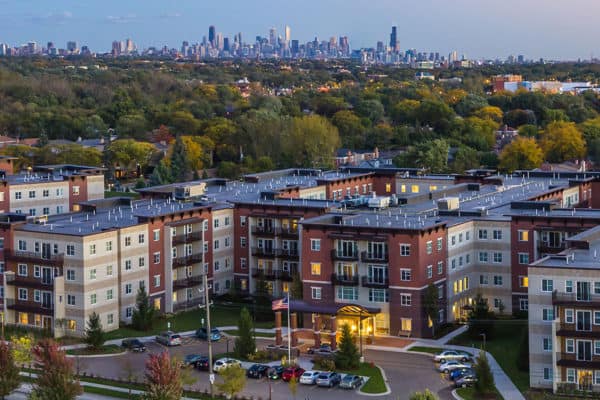 Overhead view of the Carrington at Lincolnwood and the city skyline.